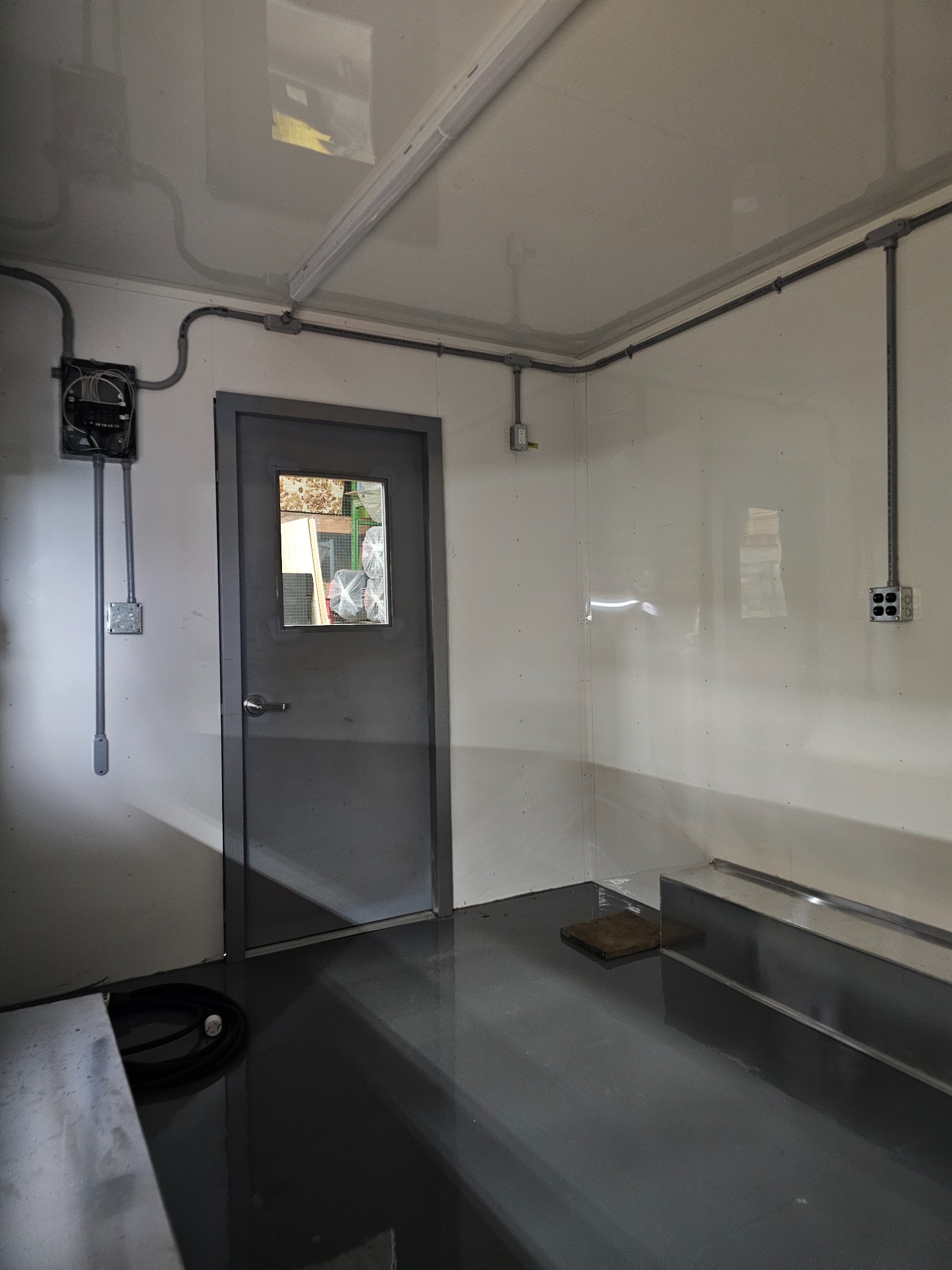 Bright interior of the trailer looking toward the door